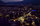 Werbeagentur · Drohnenaufnahme der Stadt Locarno bei Nacht.