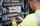 Person arbeitet an Stromkasten von UTV AG